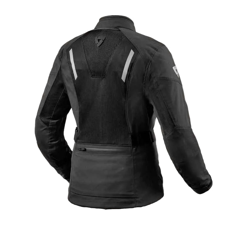 Black motorcycle jacket shown from the back, featuring textured mesh panels, reflective silver stripes on the shoulders, and a zippered rear pocket, set against a light beige background.