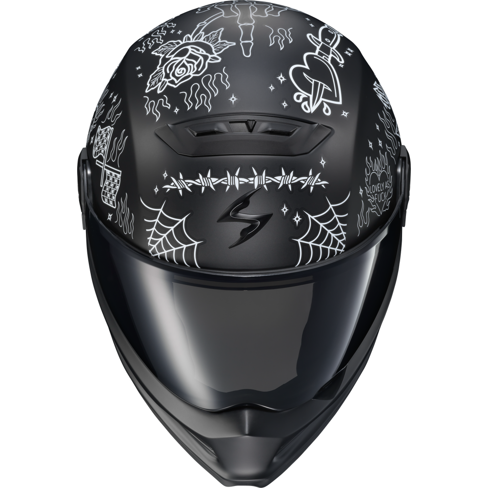 A black full-face motorcycle helmet with white gothic-style illustrations, including a rose, dagger, spiderwebs, and stars, shown against a plain white background.
