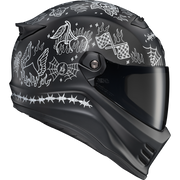 A matte black full-face motorcycle helmet with white line-art illustrations of a bird, flames, spiderwebs, checkered flags, and barbed wire, shown on a plain white background.