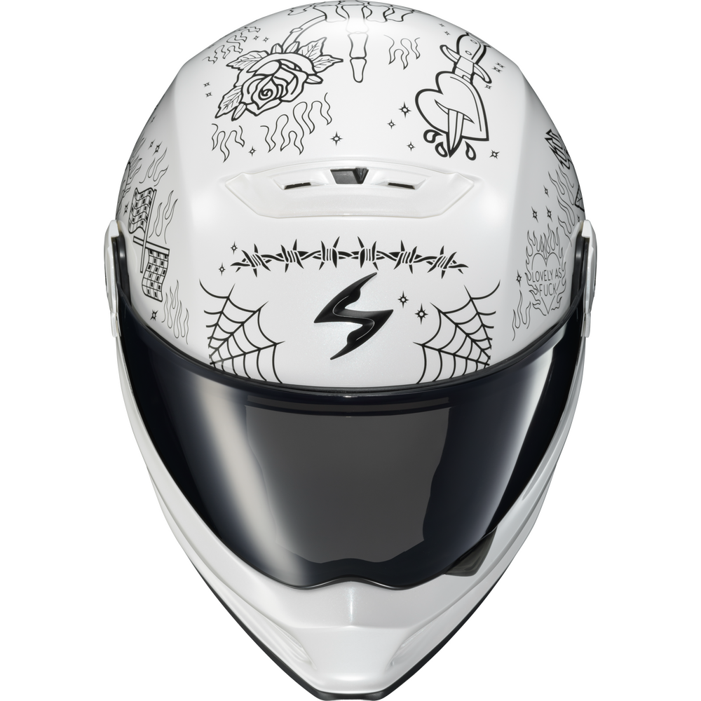 A white full-face motorcycle helmet with black graphic doodles and illustrations on the shell, featuring a dark visor.