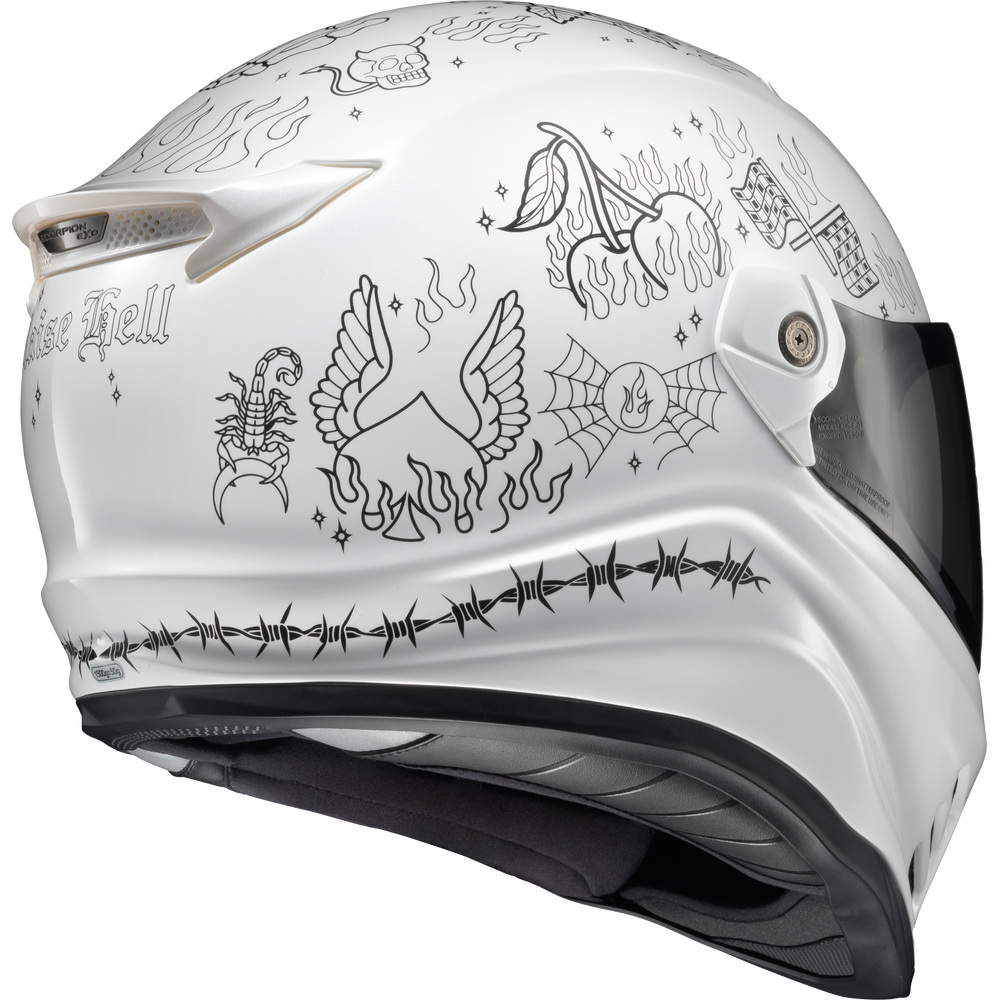 A white full-face motorcycle helmet with black graphic illustrations, including a flaming eagle, scorpion, spiderweb, skull, and barbed wire, shown against a plain white background.