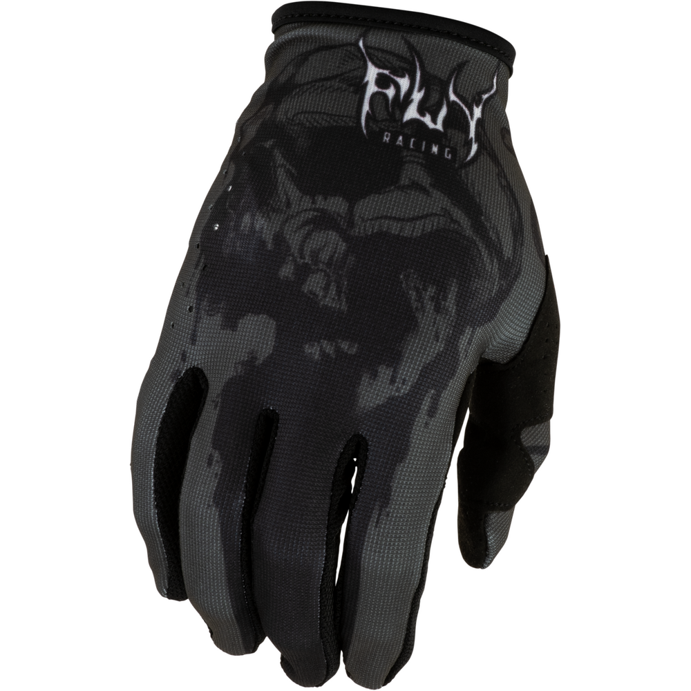 A black and dark gray motocross glove with a subtle skull pattern on the back, featuring a white and black Fox Racing logo on the cuff, set against a plain white background.