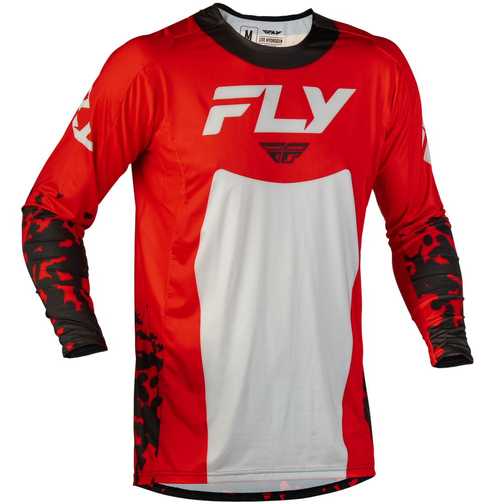 A red and white long-sleeve motocross jersey with black camouflage patterns on the sleeves and sides, featuring a large white 'FLY' logo on the chest.