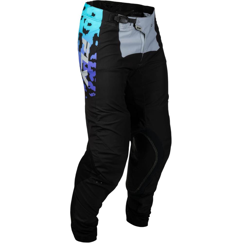 Black motocross pants with a light gray zippered pocket on the thigh, a blue and black graphic print on the upper left leg, and black knee pads.