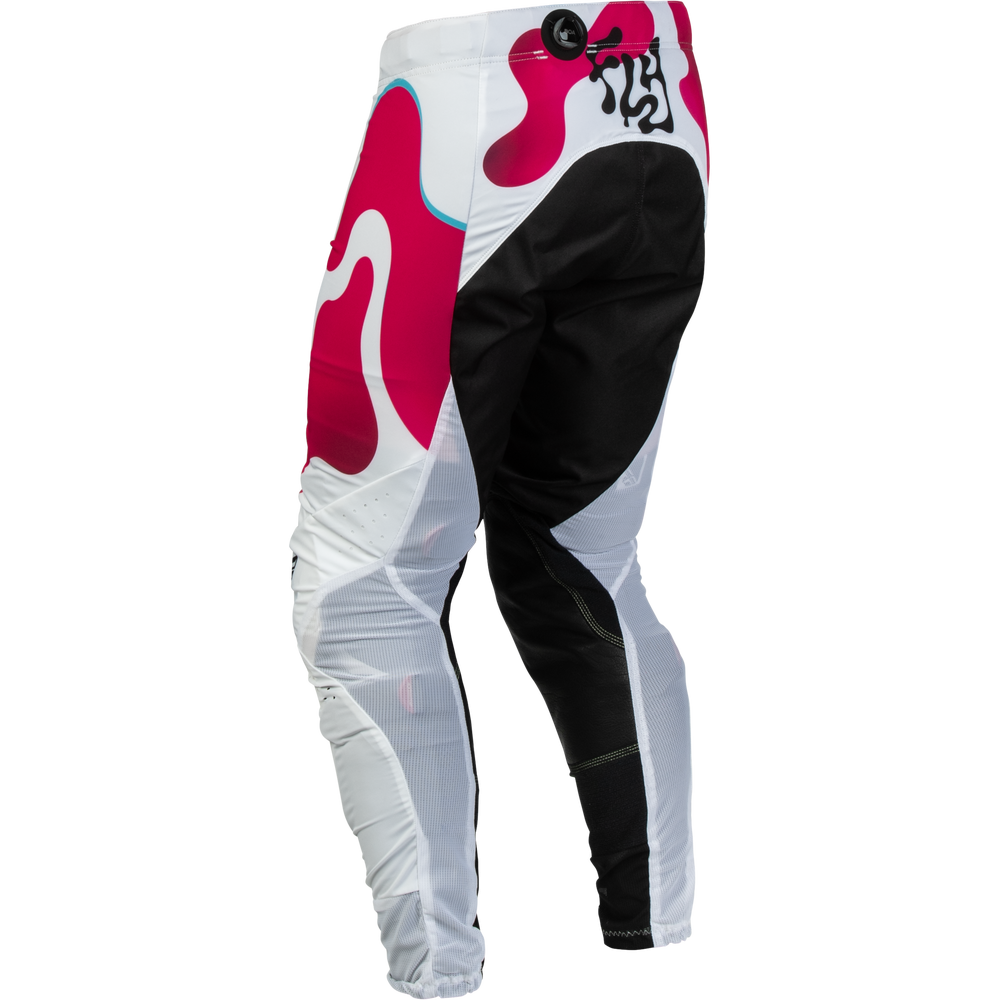 A pair of motocross pants shown from the back, featuring a color-blocked design of white, black, and hot pink with abstract graphic patterns and a black logo on the upper back.