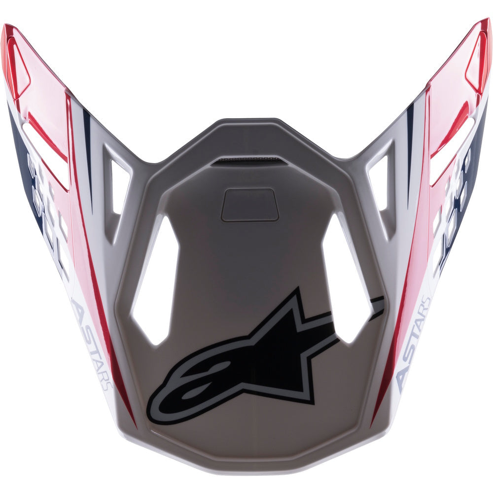 Motorcycle helmet visor with a prominent logo on a white background