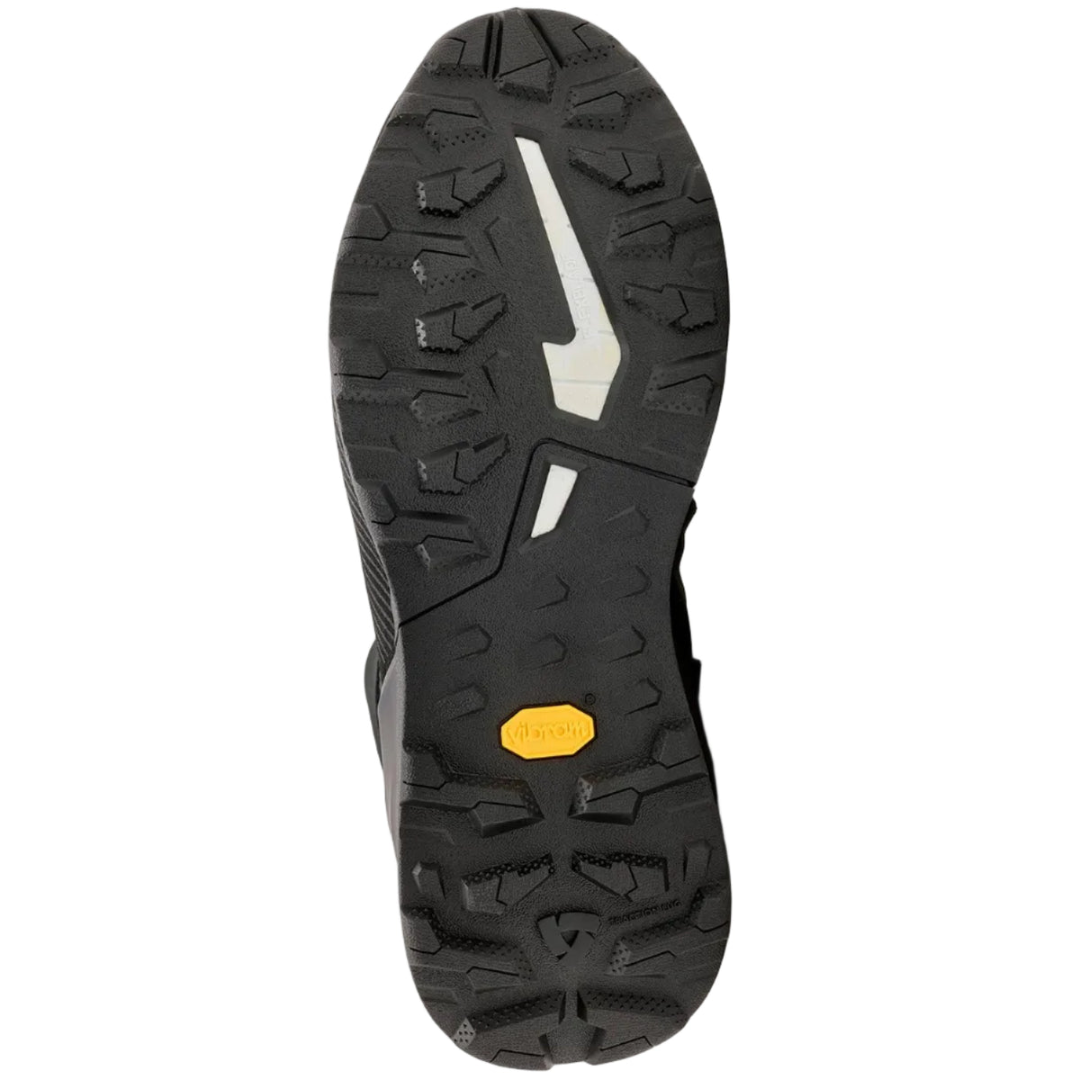 The black rubber outsole of a motorcycle boot, showing a prominent white detail logo and a small yellow Vibram badge, photographed against a light off-white background.