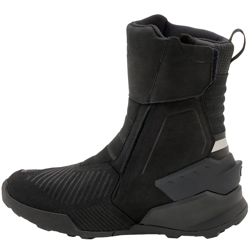 A black mid-calf boot with a textured, futuristic design and a thick sculpted sole, shown from a side profile on a light off-white background.