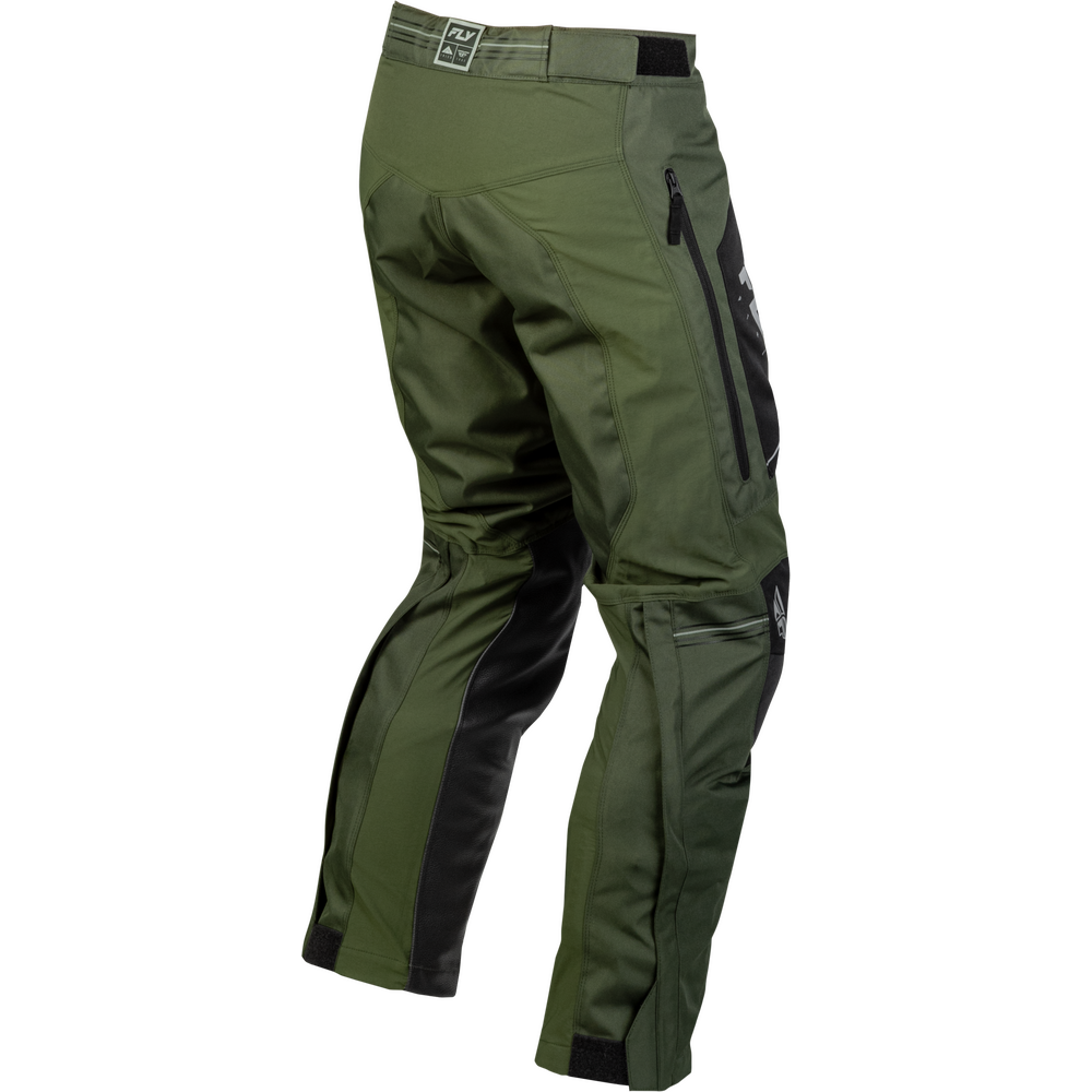Olive green technical riding pants with black side panels and zippers, shown from a three-quarters back angle on a white background.