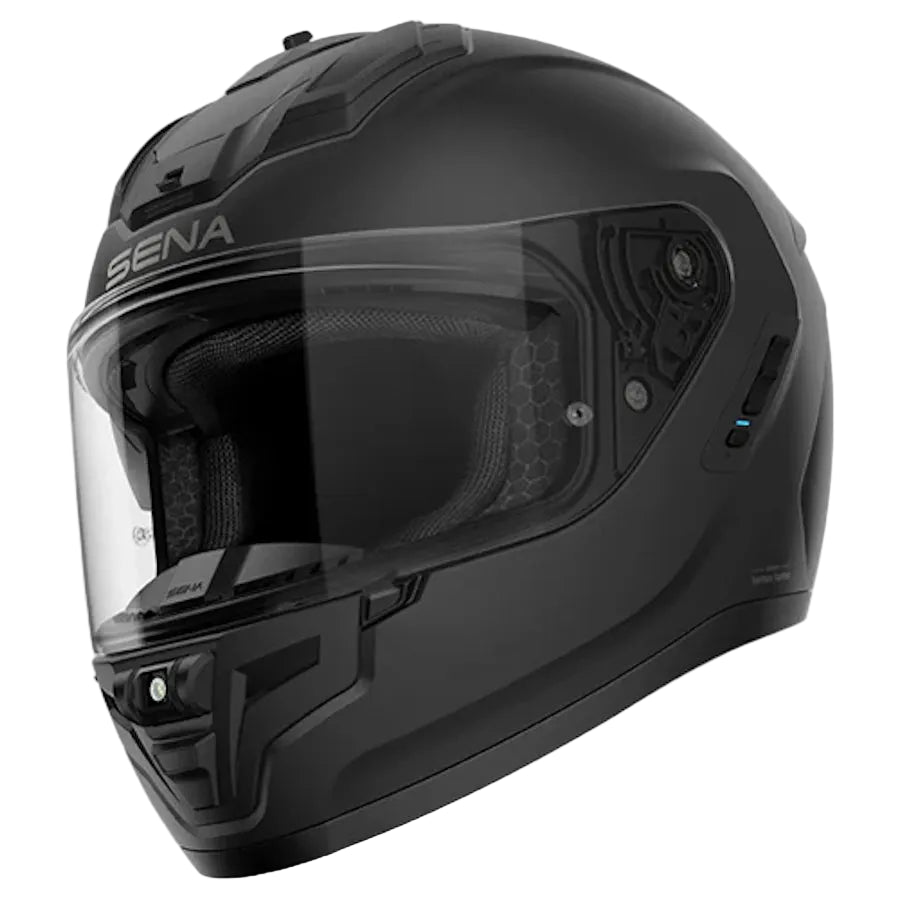 A matte black full-face motorcycle helmet with a clear visor, featuring the brand name 'SENA' on the side, shown against a plain white background.