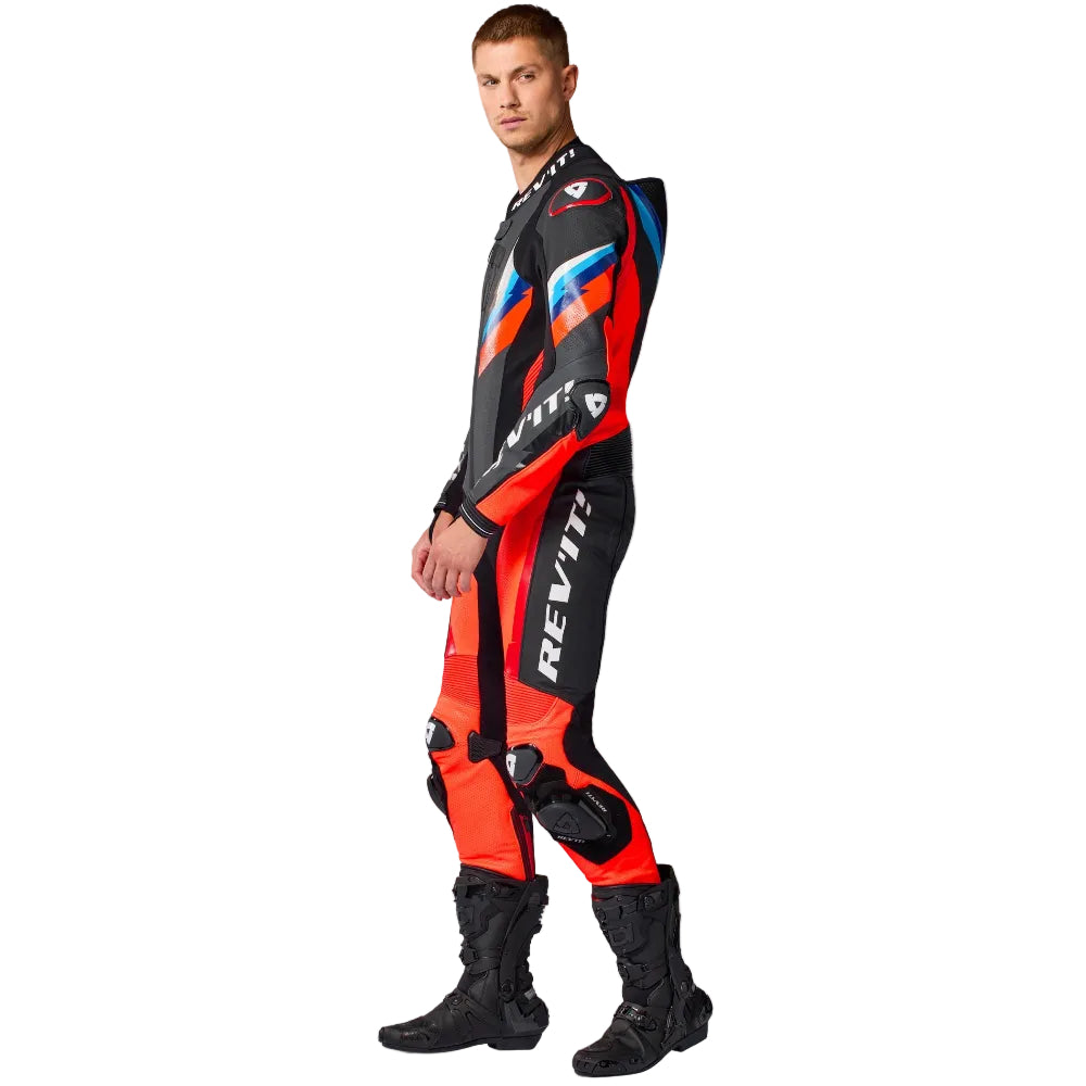 Person wearing a red and black motorcycle racing suit with 'Revit' branding on a white background