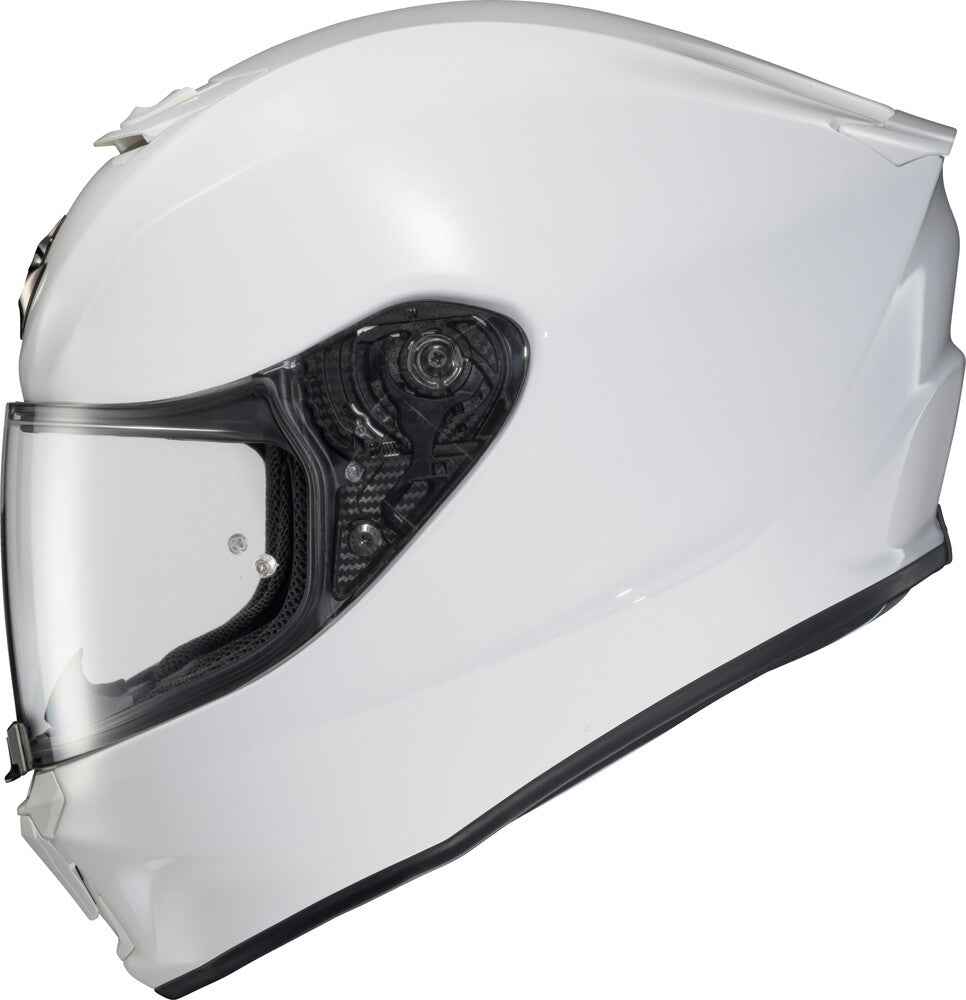White motorcycle helmet with clear visor on a white background