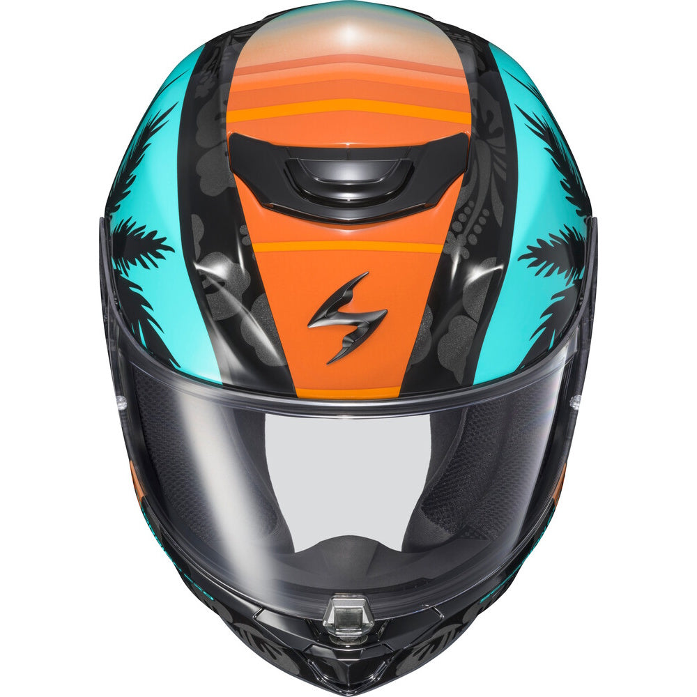 A full-face motorcycle helmet with a vibrant graphic design featuring a central orange panel, turquoise blue side sections, black palm tree silhouettes, and a clear visor, shown against a plain white background.