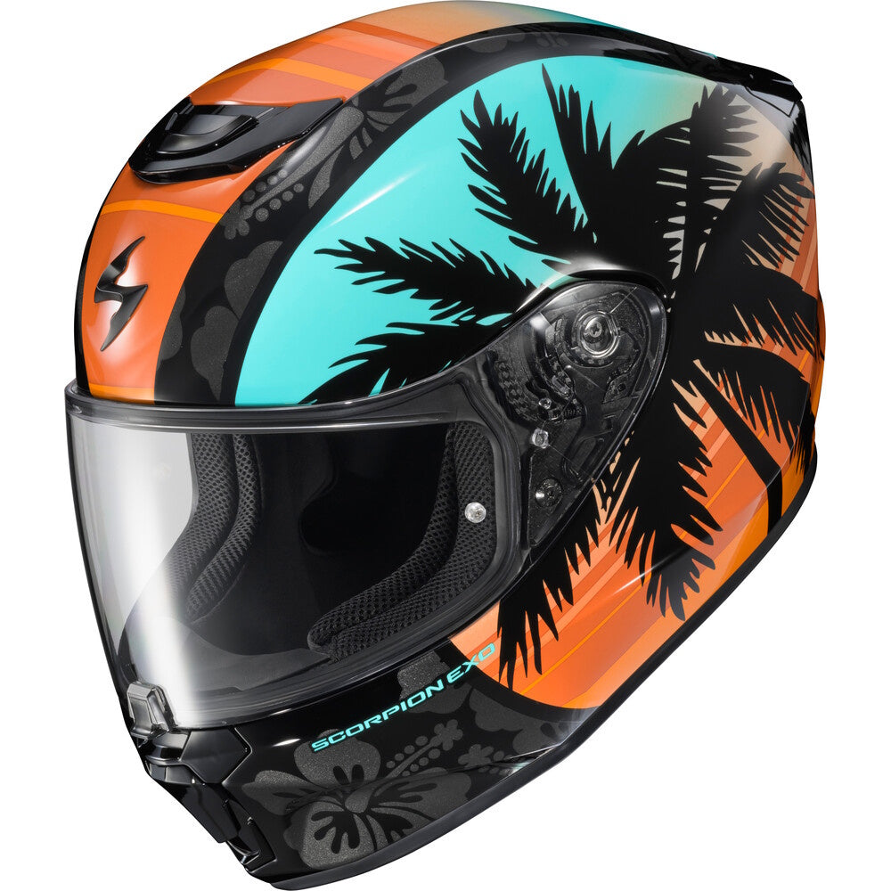 A Scorpion full-face motorcycle helmet featuring a vibrant tropical design with black palm tree silhouettes over a gradient of turquoise and orange, with a clear visor.