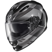 A full-face motorcycle helmet in a glossy black and dark gray color scheme with a clear visor, shown from a three-quarters angle on a white background.