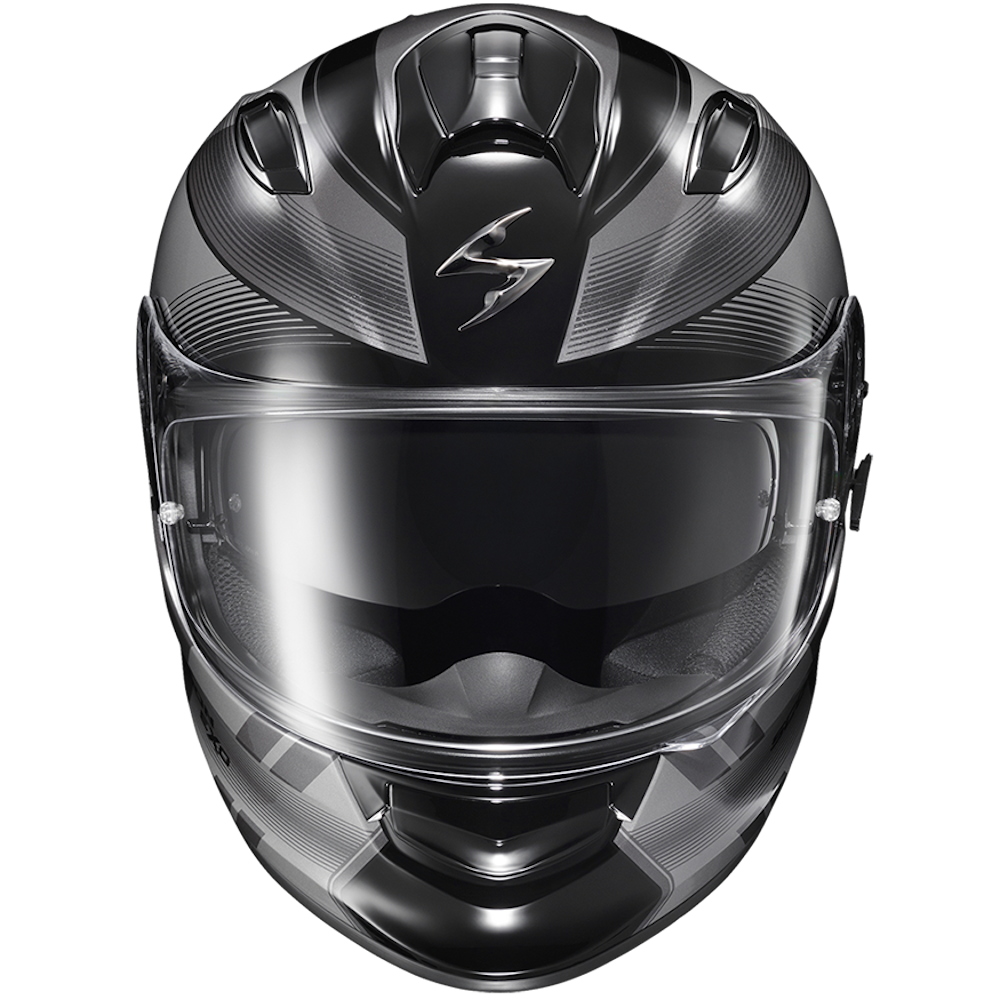 A full-face motorcycle helmet in glossy black with a carbon fiber pattern, featuring a clear visor and a stylized silver logo on the forehead, set against a plain white background.