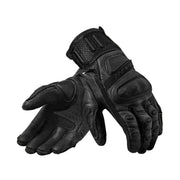 Pair of black gloves on a light gray background
