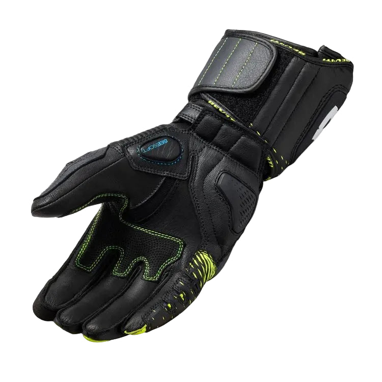 Black motorcycle glove with green accents on a white background