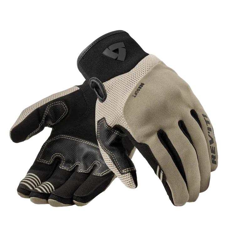 Pair of black and beige gloves on a white background