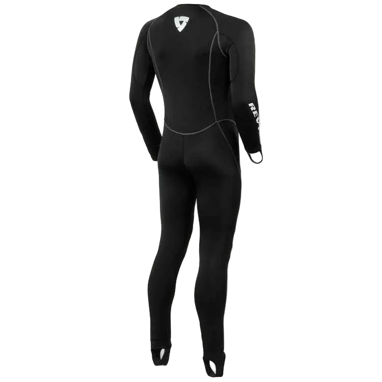 A black full-body undersuit shown from the back on a mannequin or model, with long sleeves and legs, white contrast stitching, a white shield logo on the upper back, and white branding text down one sleeve, against a light gray background.
