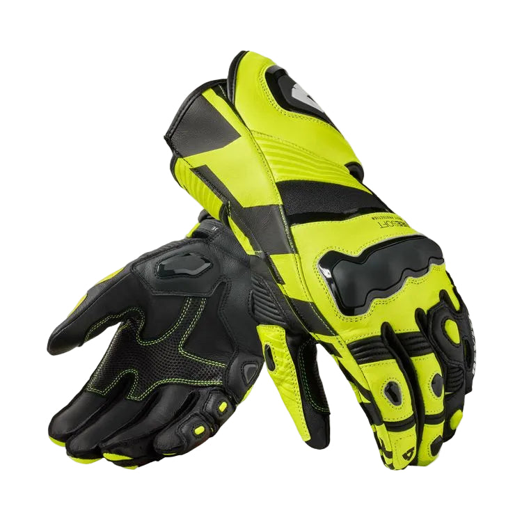 Pair of black and yellow gloves on a white background