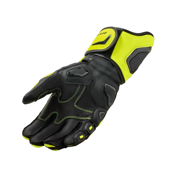 Black and yellow glove on a light gray background