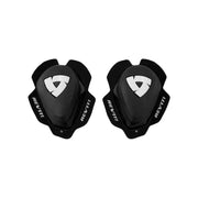 Pair of black knee pads with 'REV'IT!' branding on a light gray background