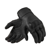 Pair of black leather gloves on a light gray background