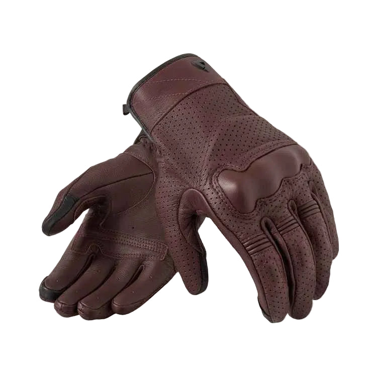 Pair of brown gloves on a white background