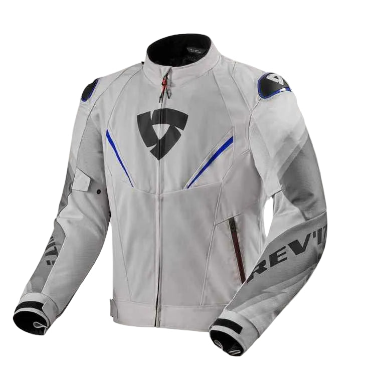 A light gray and black motorcycle jacket with blue accents, featuring the Rev'it! brand logo on the chest and sleeve, displayed against a light off-white background.