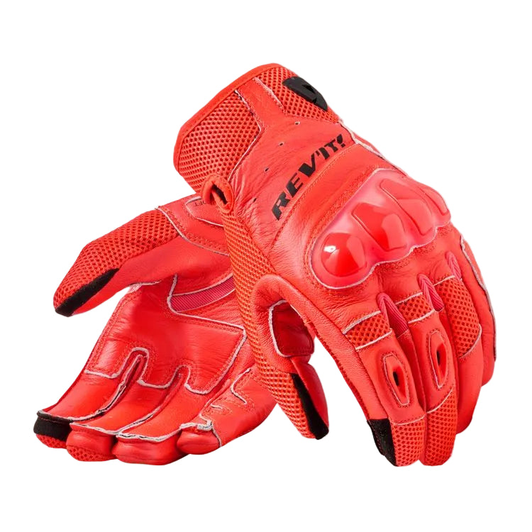 Red motorcycle gloves with 'REV'IT' branding on a light gray background