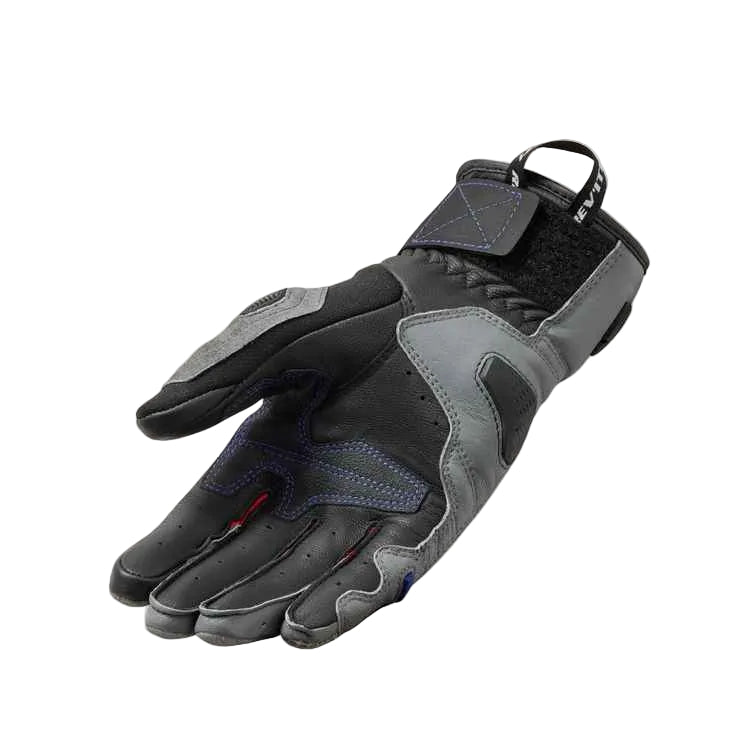 Gray and black glove on a light gray background