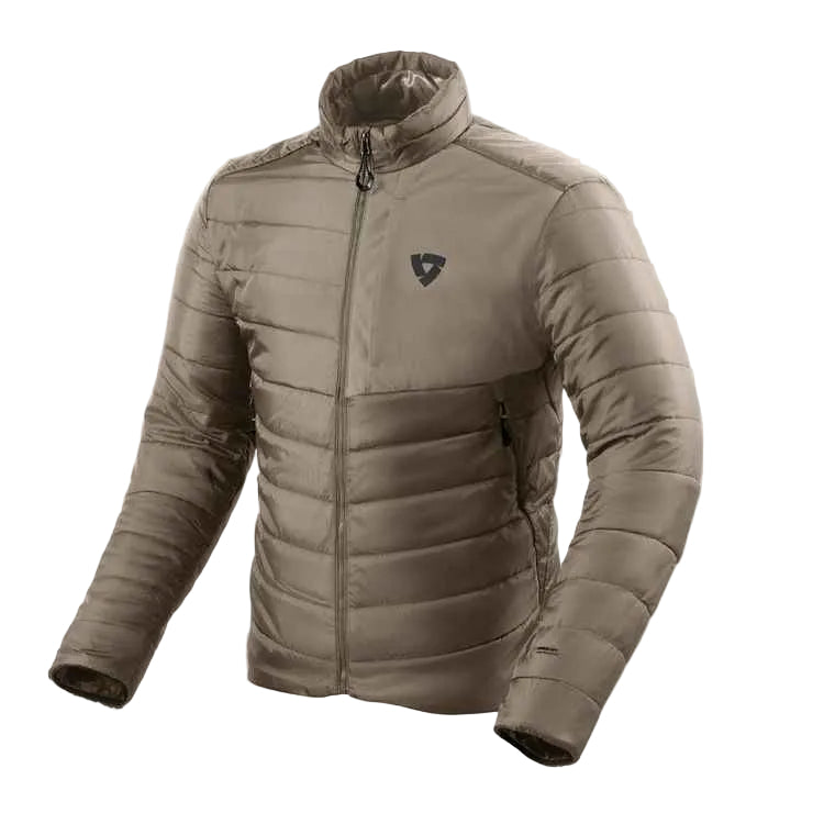 A men's quilted puffer jacket in a taupe-brown color, featuring a stand-up collar, full-length front zipper, and a small dark shield logo on the left chest, displayed on a light beige background.