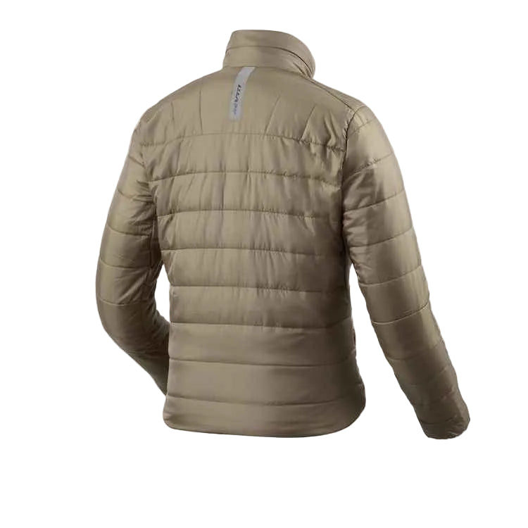 A light brown quilted puffer jacket shown from the back, featuring horizontal stitching and a small vertical reflective brand tag near the collar, set against a solid off-white background.