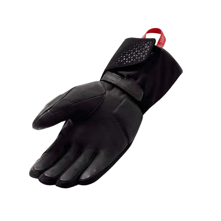 Black glove with a textured palm on a light gray background