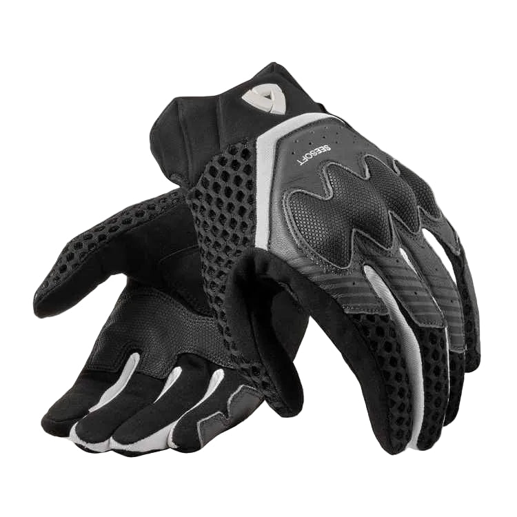 A pair of black and gray protective gloves with textured grip panels and white accents, displayed against a light off-white background.