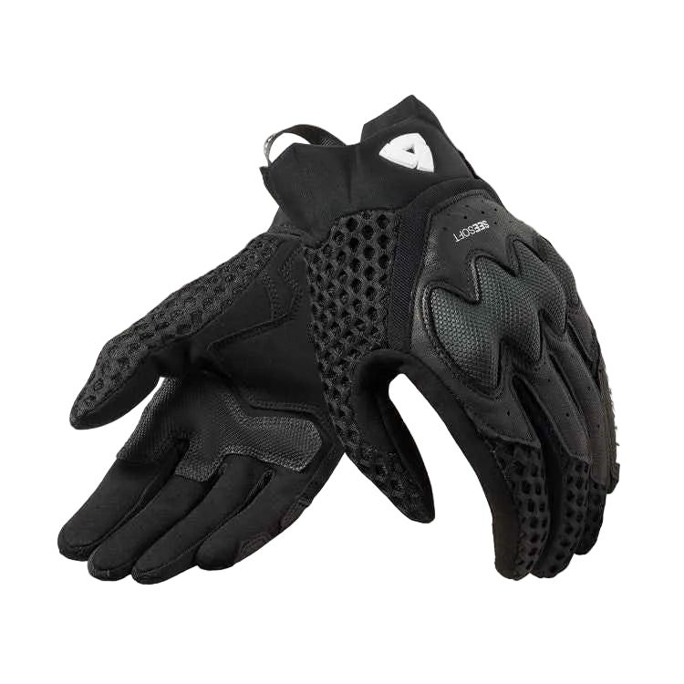 A pair of black tactical gloves with textured panels, mesh ventilation holes, and a visible 'Seesoft' brand logo on the back of one glove, set against a solid off-white background.