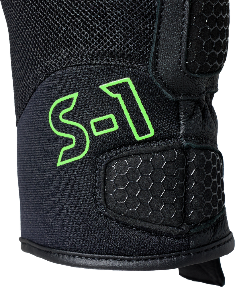 Black protective gear with green 'S-1' logo on a white background