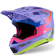 A motocross full-face helmet in a vibrant purple colorway with blue, pink, orange, and lime green accents, shown from a three-quarters angle on a white background.
