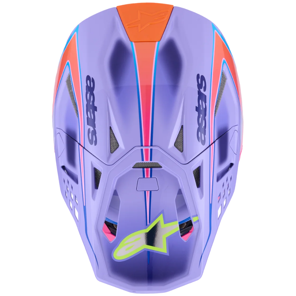 A front-facing view of an Alpinestars full-face motocross helmet in a lavender purple colorway with orange and pink graphic accents, on a solid white background.