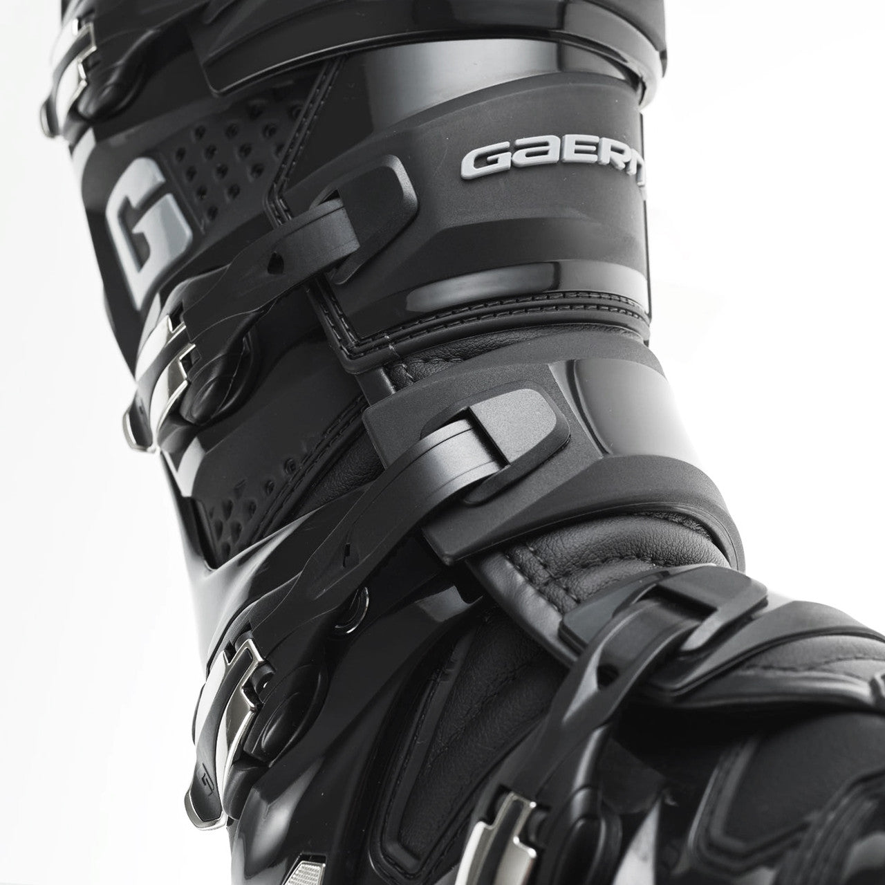 Black Gaerne motocross boot on a white background