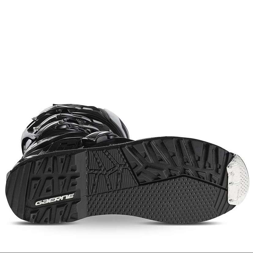 Black boot sole with brand logo on a white background