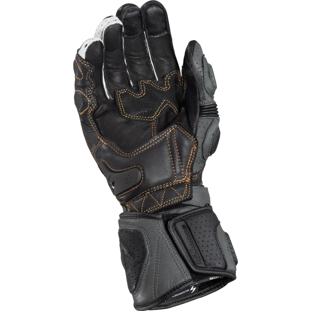 Black motorcycle glove with brown stitching on a white background