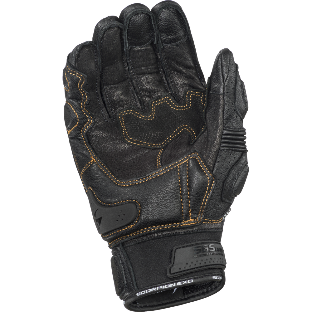 Black leather glove with brown stitching on a white background