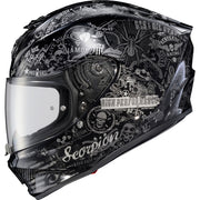 A black full-face motorcycle helmet with a clear visor, decorated with intricate white and gray gothic, skull, and mechanical doodle graphics. The graphic features various text elements such as 'Scorpion', 'High Performance', and 'Diamond'.