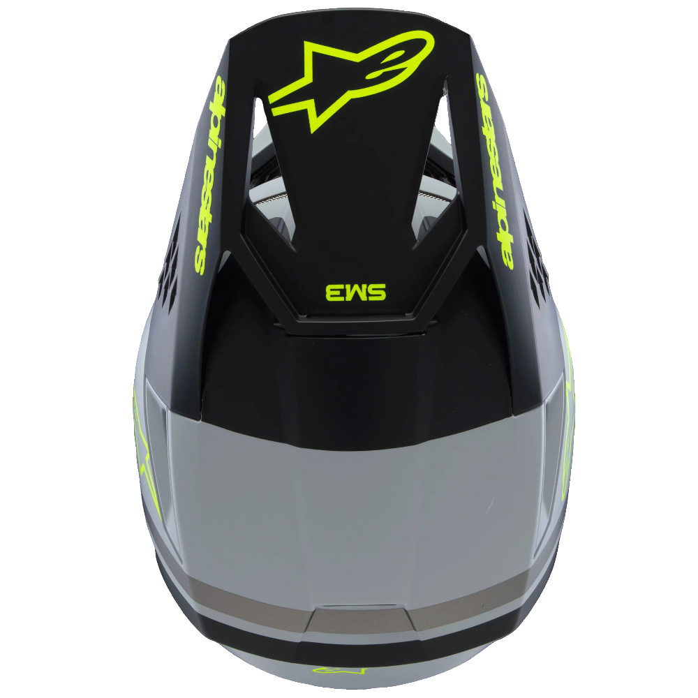 Black and gray helmet with neon yellow accents on a white background