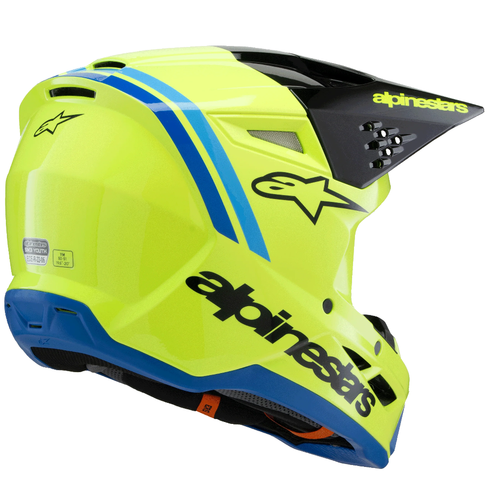 A bright neon yellow Alpinestars full-face mountain bike helmet with blue and black accents, shown from a three-quarters rear angle on a plain white background.