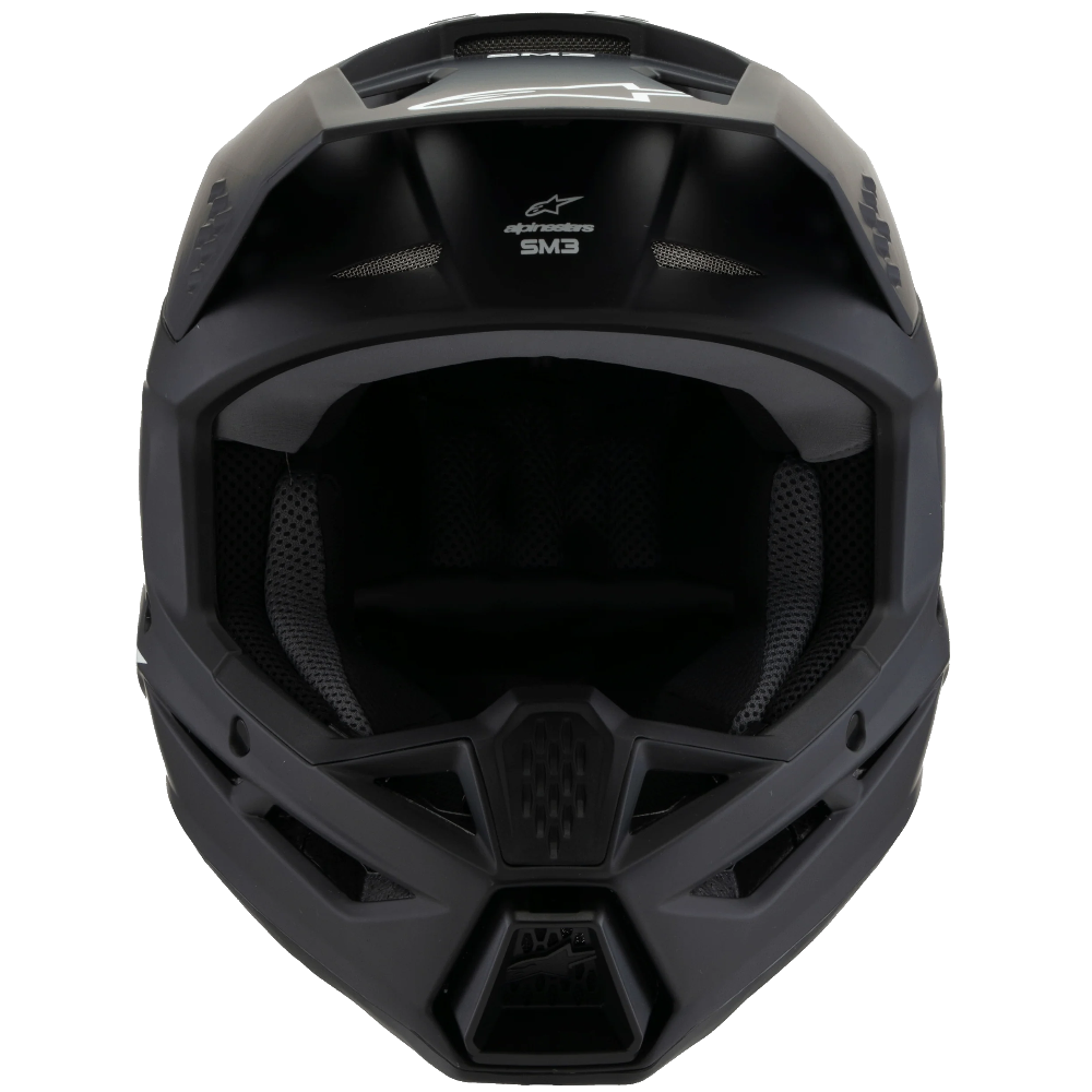 A matte black full-face motocross helmet shown from the front on a solid white background, featuring a clear visor and visible TMS branding.