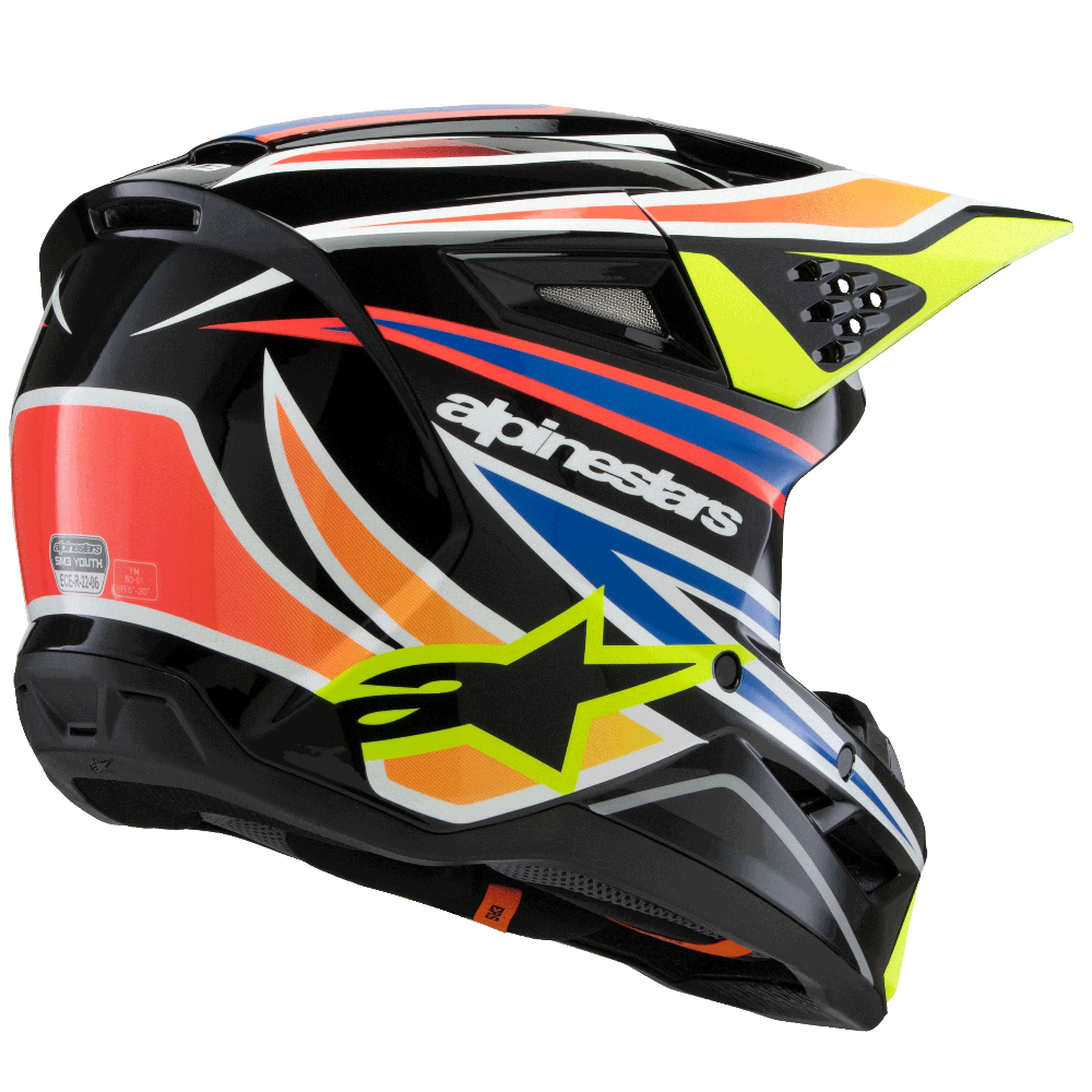 Alpinestars full-face motocross helmet in black with vibrant orange, yellow, blue, and white graphic accents, shown from a side profile against a solid black background.