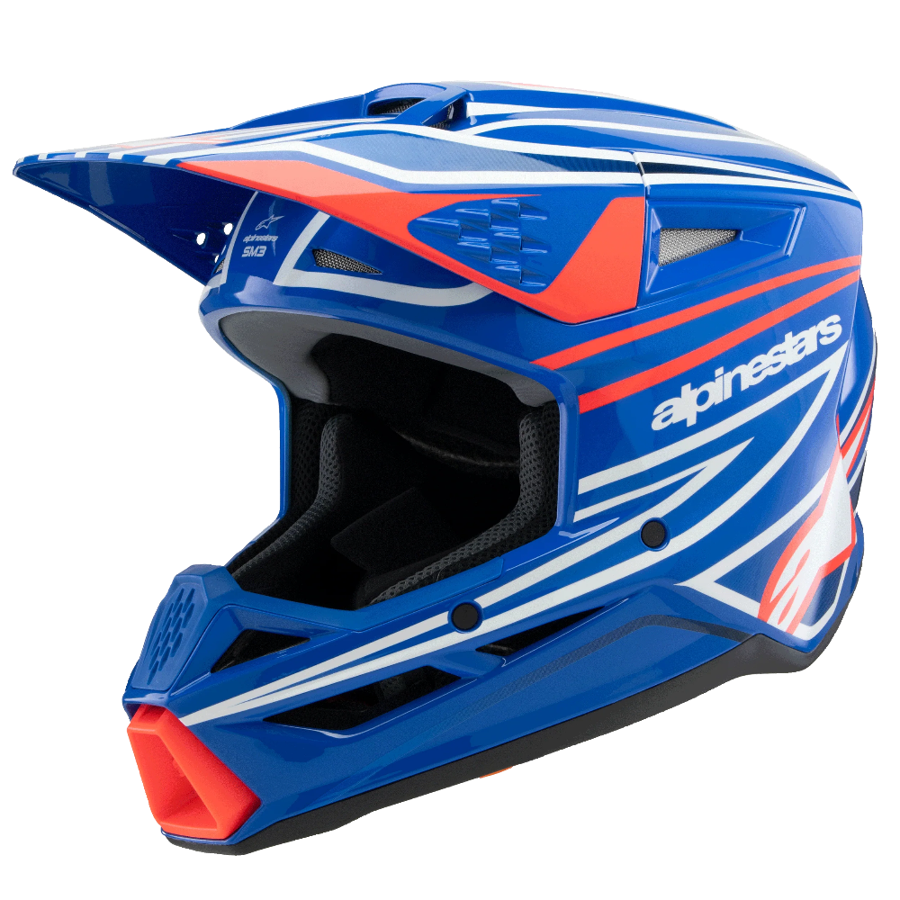 Blue and red motocross helmet with 'alpinestars' branding on a black background